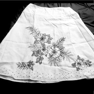 Linen skirt with black beading and fine detailed floral stitching